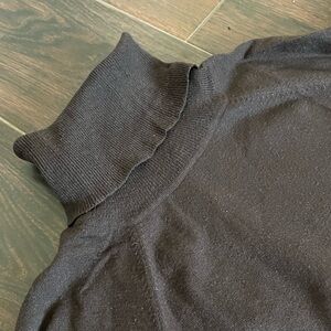 Brown turtleneck sweater